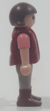 1992 Geobra Playmobil Small Brunette Girl Child Grey Pants Pink and Black Shirt with Magenta Vest 2 1/8" Tall Toy Figure