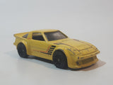 2014 Hot Wheels HW Workshop: Night Burnerz Mazda RX-7 Yellow Die Cast Toy Car Vehicle