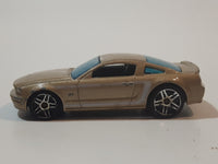 2007 Hot Wheels 2005 Ford Mustang GT Champagne Gold Die Cast Toy Car Vehicle