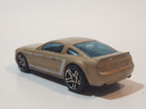 2007 Hot Wheels 2005 Ford Mustang GT Champagne Gold Die Cast Toy Car Vehicle