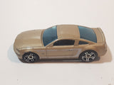 2007 Hot Wheels 2005 Ford Mustang GT Champagne Gold Die Cast Toy Car Vehicle