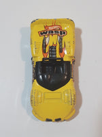 2002 Hot Wheels Insectiride Chaparral 2 Yellow Die Cast Toy Car Vehicle