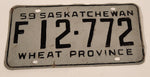 Vintage 1959 Saskatchewan Wheat Province Farm Vehicle Black Lettering Grey Vehicle License Plate Metal Tag 12 772