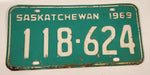 Vintage 1969 Saskatchewan White Lettering Green Vehicle License Plate Metal Tag 118 624