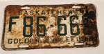 Vintage 1955 Saskatchewan Golden Jubilee Farm Vehicle Green Lettering White Vehicle License Plate Metal Tag 86 668