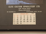 1978 Elite Custom Upholstery Ltd "And" Wicker World Saskatoon, Sask. Calendar on Leather Backing Framed Never Used