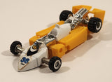 Vintage 1984 Tonka Bandai Go-Bots Slicks F1 Formula 1 #36 Yellow and White 4 1/4" Transforming Toy Car Action Figure