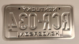 1987 Kentucky Henderson Dark Blue with White Letters Embossed Metal Vehicle License Plate Tag RCR 034