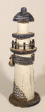 White and Blue Lighthouse with Fish and Fishing Nets Hanging 8 1/2" Wood Ornament