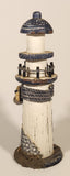 White and Blue Lighthouse with Fish and Fishing Nets Hanging 8 1/2" Wood Ornament