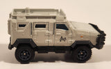 2018 Matchbox Jurassic World: Island Transport Team Textron Tiger Light Beige Die Cast Toy Car Vehicle