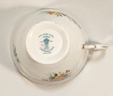 Vintage Crown Fine Bone China Staffordshire England Mixed Flower Pattern Blue and White Gold Trim Tea Cup Saucer