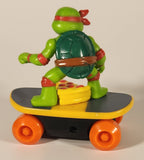 2023 Viacom TMNT Teenage Mutant Ninja Turtles Switch Kick Skaters Raphael on Skateboard with Pizza 3" Toy Figure