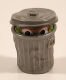 Sesame Street Oscar The Grouch in Garbage Can Pop Up Plastic Toy Figure