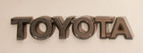 Toyota Plastic Metal Look Emblem Nameplate Badge Logo OEM