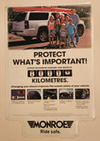 2010 Tenneco Monroe Shocks & Struts Protect What's Important 80,000 Kilometres Ride Safe 15 3/4" x 23 3/4" Tin Metal Sign