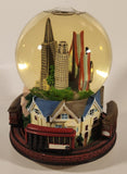 The San Francisco Music Box Company Wind Up Musical Animated Moving Trolley Street Car 7 1/4" Resin Snow Globe