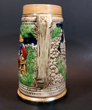 1950s German Oktoberfest Beer Stein Woman Serving Beer to Man Sitting - Japan 6 3/8" Tall - Treasure Valley Antiques & Collectibles