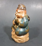 1960-1980 Inarco Japan Man Sitting on a Rock with a Fish Ceramic Figurine E-5900