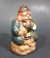 1960-1980 Inarco Japan Man Sitting on a Rock with a Fish Ceramic Figurine E-5900