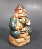 1960-1980 Inarco Japan Man Sitting on a Rock with a Fish Ceramic Figurine E-5900