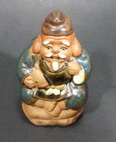 1960-1980 Inarco Japan Man Sitting on a Rock with a Fish Ceramic Figurine E-5900