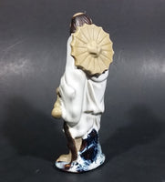 Vintage Balding Man with a Beard in a White Robe With a Tan Hat Ceramic Figurine - Treasure Valley Antiques & Collectibles