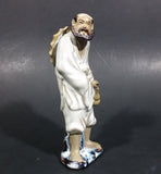 Vintage Balding Man with a Beard in a White Robe With a Tan Hat Ceramic Figurine - Treasure Valley Antiques & Collectibles