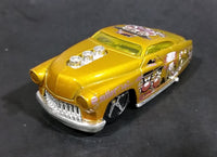 2005 Hot Wheels Crazed Clowns Series II '49 Merc (HardNoze) Gold Die Cast Toy Car Vehicle - Treasure Valley Antiques & Collectibles