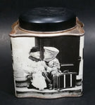 Black and White Photograph Cocoa Storage Tin of a Boy and a Girl Sitting in Different Scenes - Treasure Valley Antiques & Collectibles