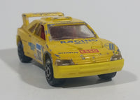 Vintage Majorette Peugeot 405 T 16 Yellow No. 202 with Esso and Michelin Logos 1/60 Scale Die Cast Toy Car Vehicle Made in France - Treasure Valley Antiques & Collectibles