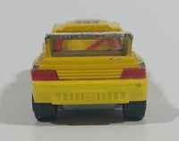 Vintage Majorette Peugeot 405 T 16 Yellow No. 202 with Esso and Michelin Logos 1/60 Scale Die Cast Toy Car Vehicle Made in France - Treasure Valley Antiques & Collectibles