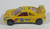 Vintage Majorette Peugeot 405 T 16 Yellow No. 202 with Esso and Michelin Logos 1/60 Scale Die Cast Toy Car Vehicle Made in France - Treasure Valley Antiques & Collectibles