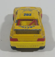 Vintage Majorette Peugeot 405 T 16 Yellow No. 202 with Esso and Michelin Logos 1/60 Scale Die Cast Toy Car Vehicle Made in France - Treasure Valley Antiques & Collectibles