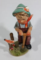 Vintage Boy with Shovel Bird on a Post Ceramic Figurine - Hummel Style Japan - Repairs - Treasure Valley Antiques & Collectibles