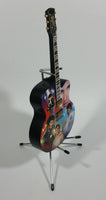 Collectible Elvis Presley Rockin' Through The Years Limited Edition 12" Musical Guitar with Stand and Certificate