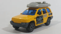 1999 Matchbox Jeep Grand Cherokee Yellow with Grey Raft Die Cast Toy Car Vehicle