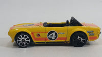 2011 Hot Wheels Track Stars Triumph TR6 Yellow #4 Die Cast Toy Race Car Vehicle