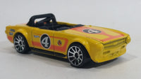 2011 Hot Wheels Track Stars Triumph TR6 Yellow #4 Die Cast Toy Race Car Vehicle