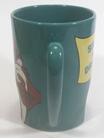 1998 Warner Bros Looney Tunes Taz Tasmanian Devil Cartoon Character "Sink It and Drink It!" Dark Green Ceramic Coffee Mug with Hole For Golf Ball Underneath