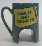 1998 Warner Bros Looney Tunes Taz Tasmanian Devil Cartoon Character "Sink It and Drink It!" Dark Green Ceramic Coffee Mug with Hole For Golf Ball Underneath