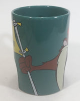 1998 Warner Bros Looney Tunes Taz Tasmanian Devil Cartoon Character "Sink It and Drink It!" Dark Green Ceramic Coffee Mug with Hole For Golf Ball Underneath