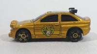 2003 Hot Wheels Flamin' Ford Escort Rally #5 Gold Die Cast Toy Car Vehicle