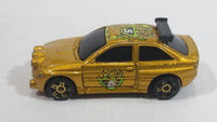 2003 Hot Wheels Flamin' Ford Escort Rally #5 Gold Die Cast Toy Car Vehicle