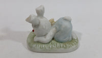 Very Cute and Curious Bunny Rabbit Touching Red Lady Bug Ceramic Figurine Decorative Ornament