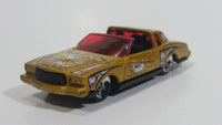 2002 Hot Wheels Trump Cars Montezooma Metalflake gold Die Cast Toy Car Vehicle