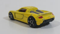 2009 Hot Wheels Dream Garage Porsche Carrera GT Yellow Die Cast Toy Car Vehicle