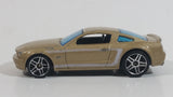 2007 Hot Wheels 2005 Ford Mustang GT Champagne Gold Die Cast Toy Car Vehicle