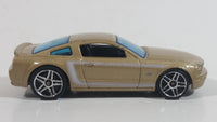 2007 Hot Wheels 2005 Ford Mustang GT Champagne Gold Die Cast Toy Car Vehicle