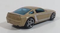 2007 Hot Wheels 2005 Ford Mustang GT Champagne Gold Die Cast Toy Car Vehicle